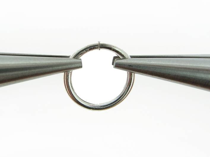 Learn how to open a split ring with the greatest of ease. Check