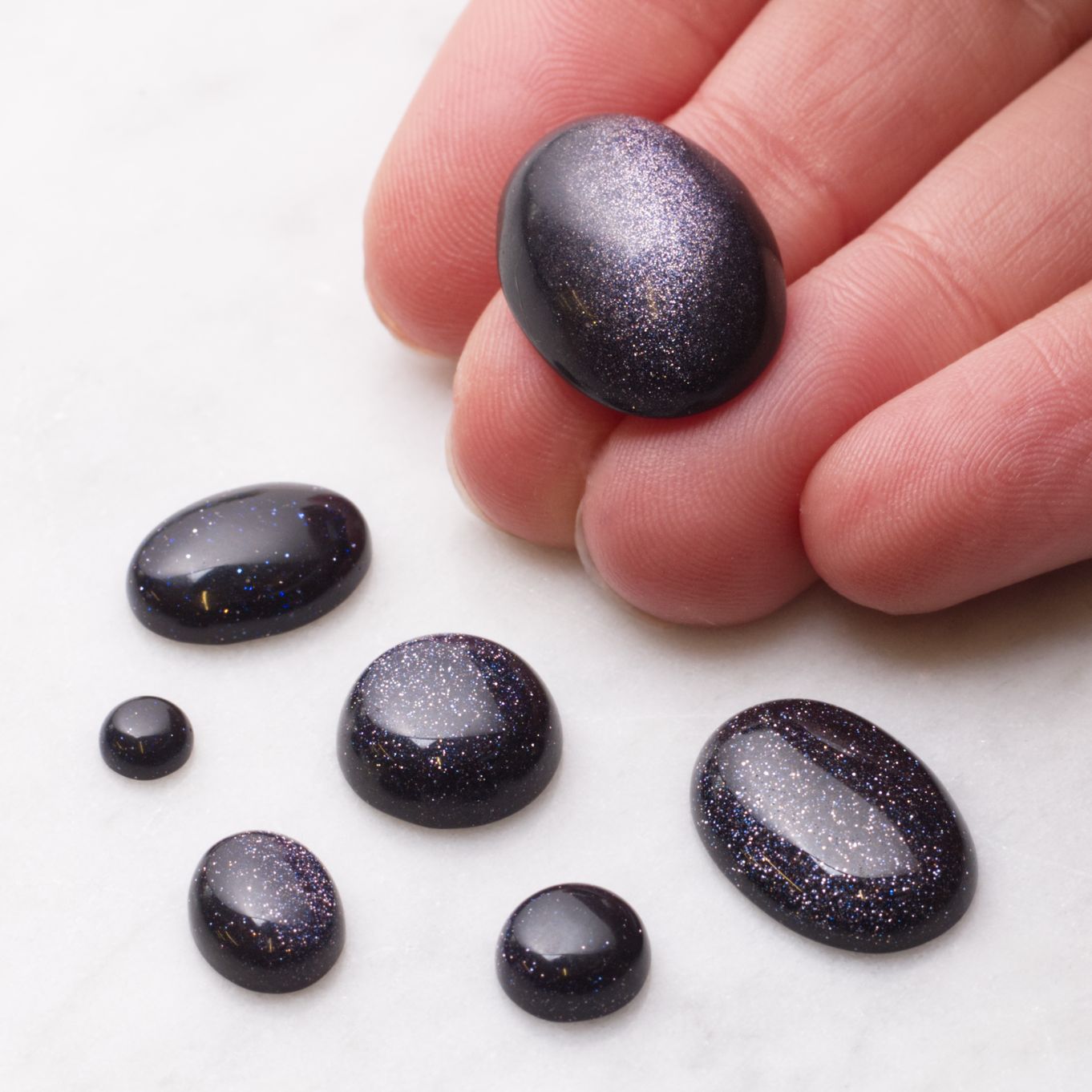 Sparkly black stone on sale name