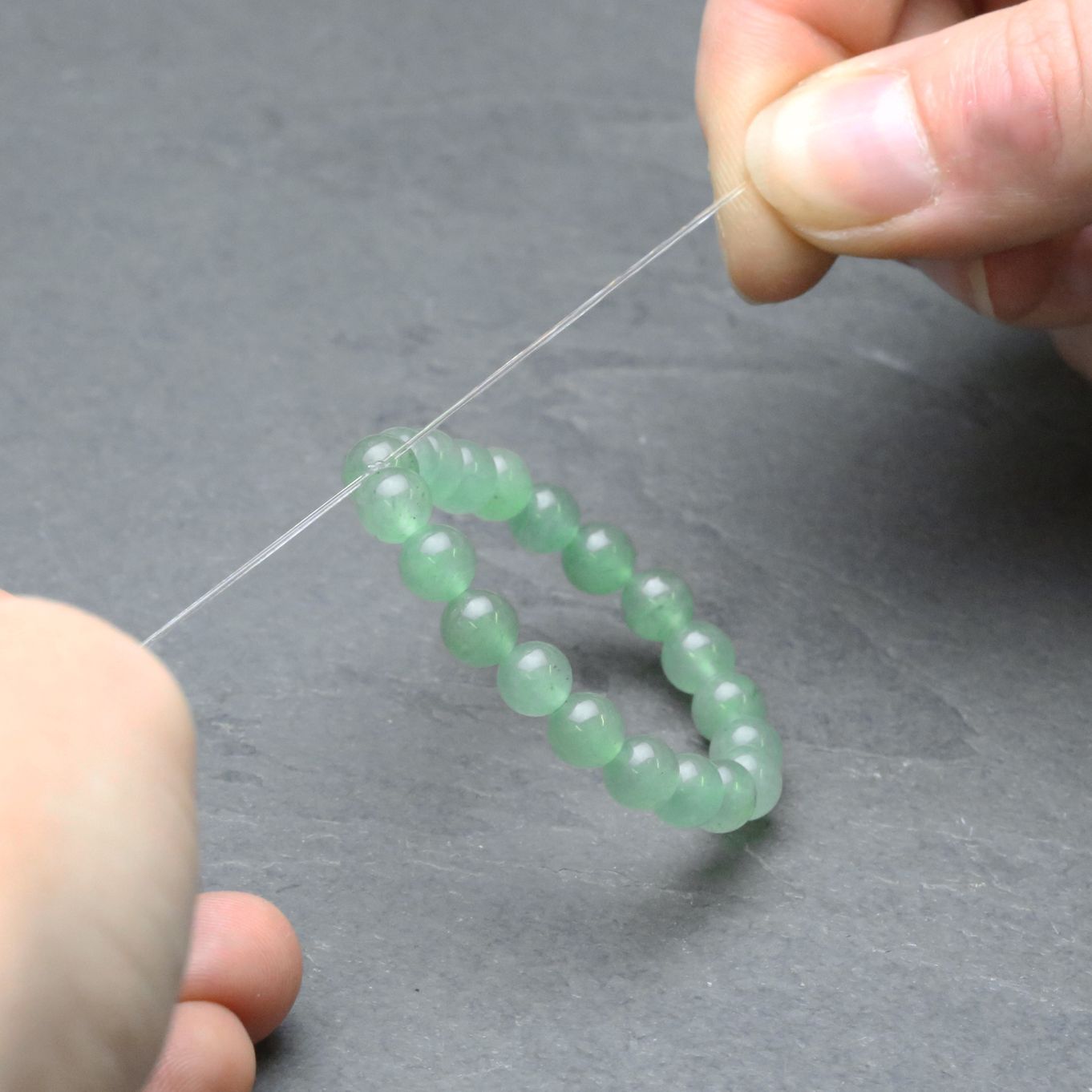 Here's how I knot .7mm Stretch Magic on Tila Bead bracelets