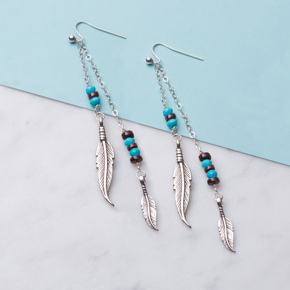 Silver feather earrings with turquoise sale