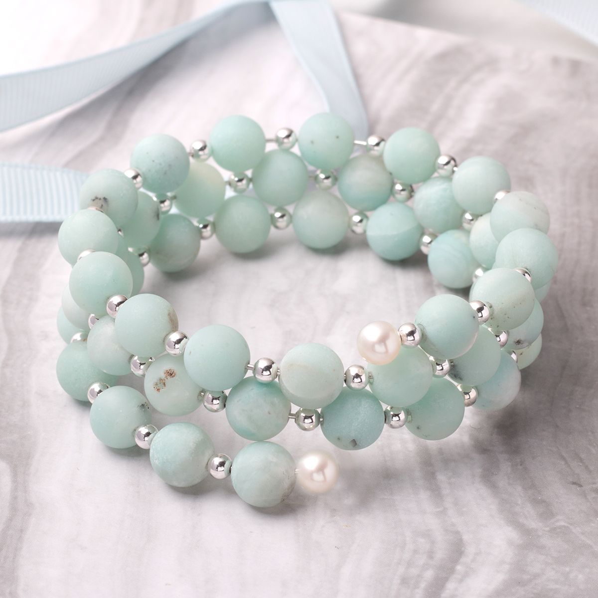 d8 memory wire bracelet pearl half drilled.jpg