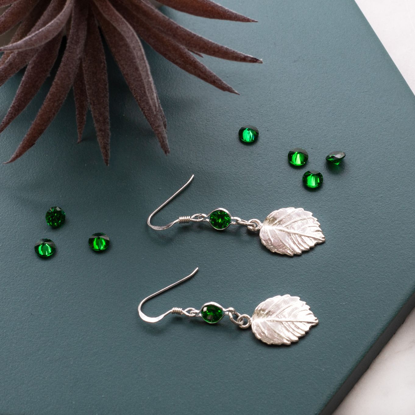 Emerald Coloured Leaf Drop Earrings