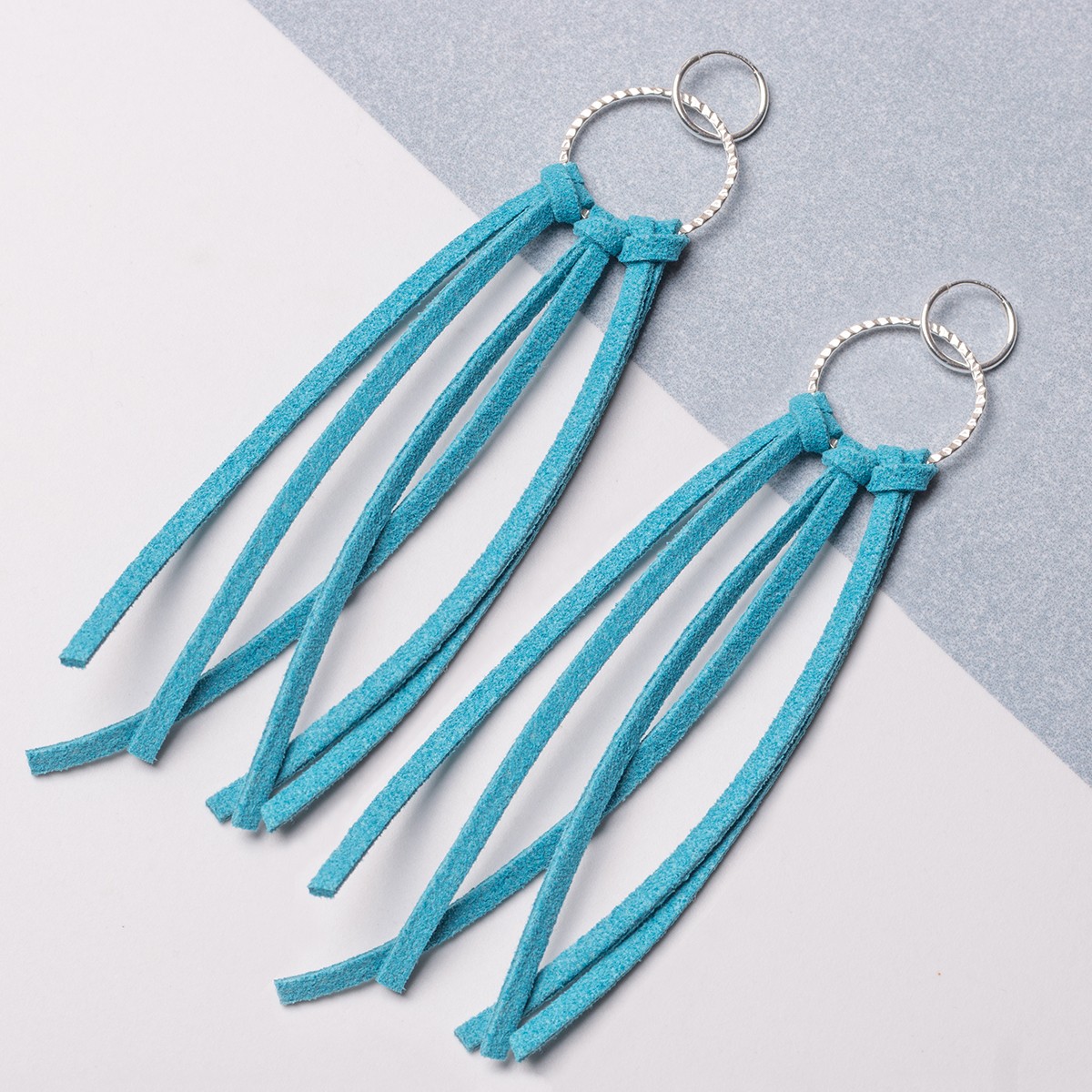 turquoise flat suede tassel earrings.jpg