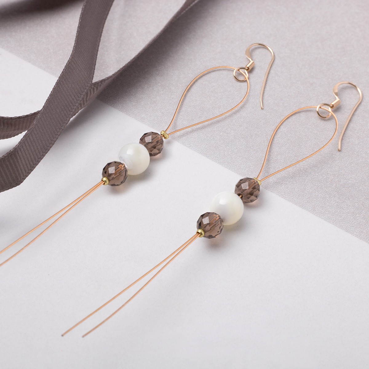 smokey quartz and mother of pearl earrings.jpg