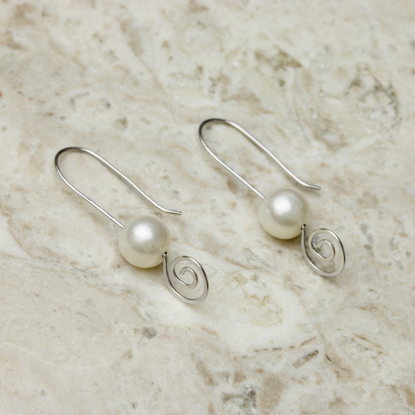 pearl spiral earrings on marble.jpg