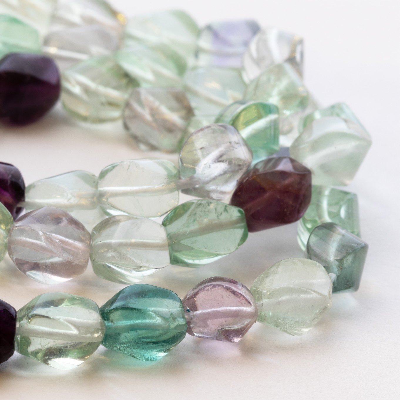 Rainbow Fluorite Twisted Beads - Approx 8x6mm