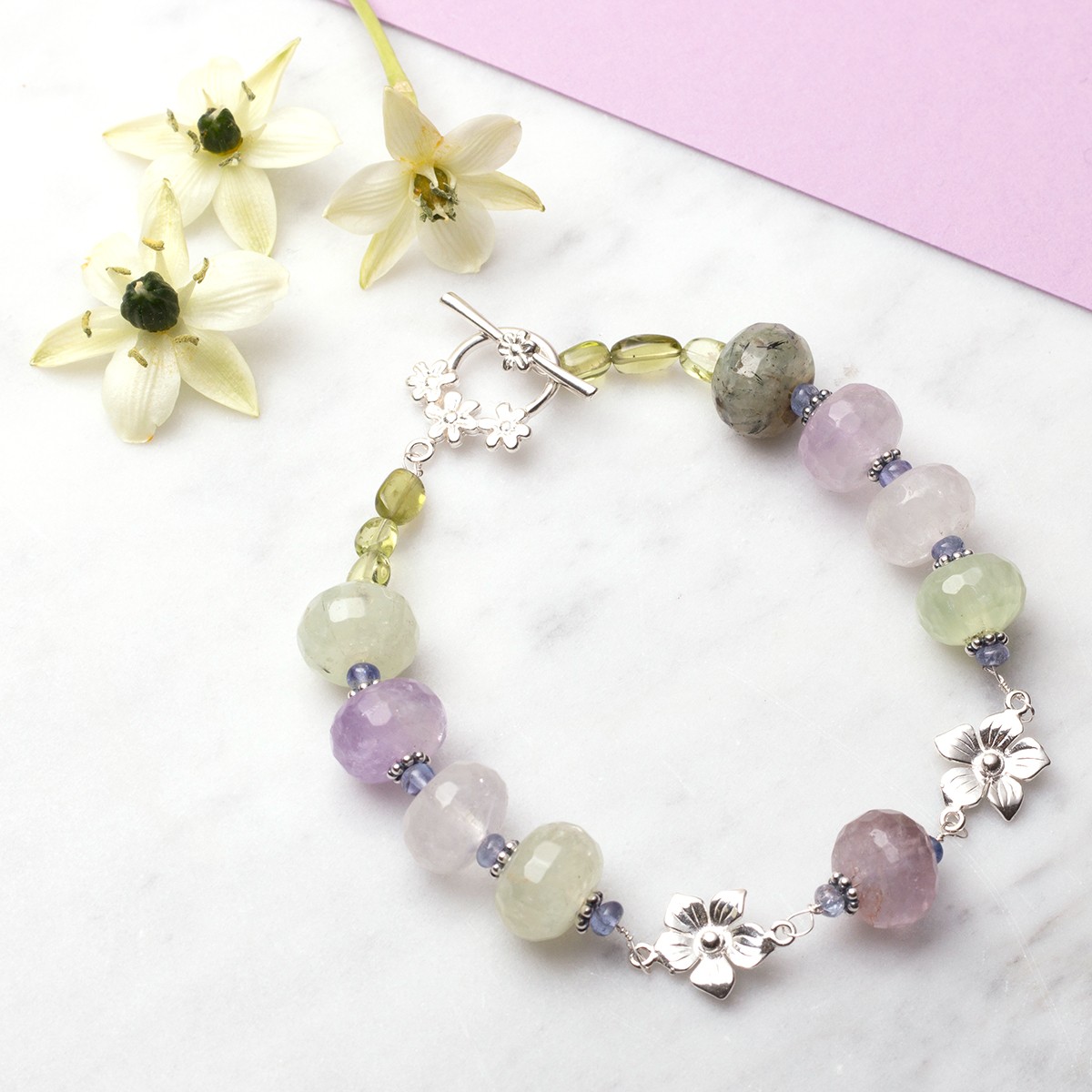 quartz and tanzanite flower bracelet.jpg