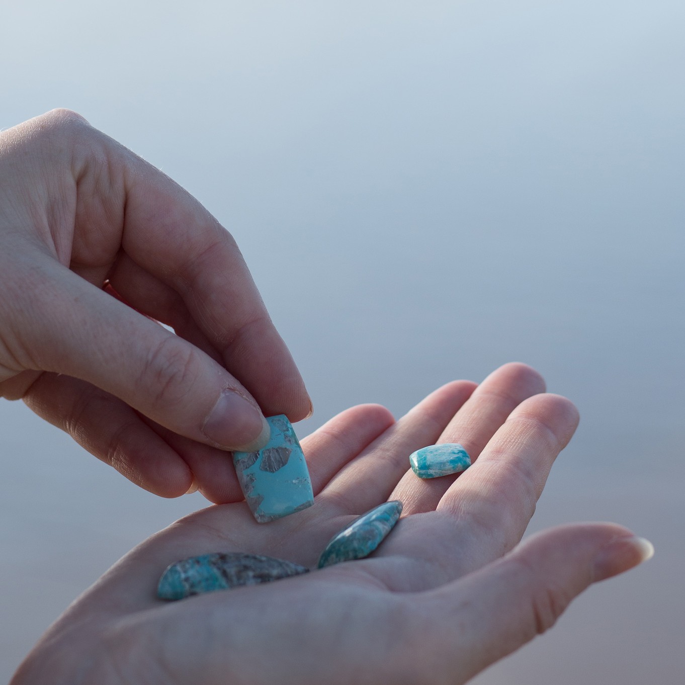 cornish turquoise in hand sq.jpg