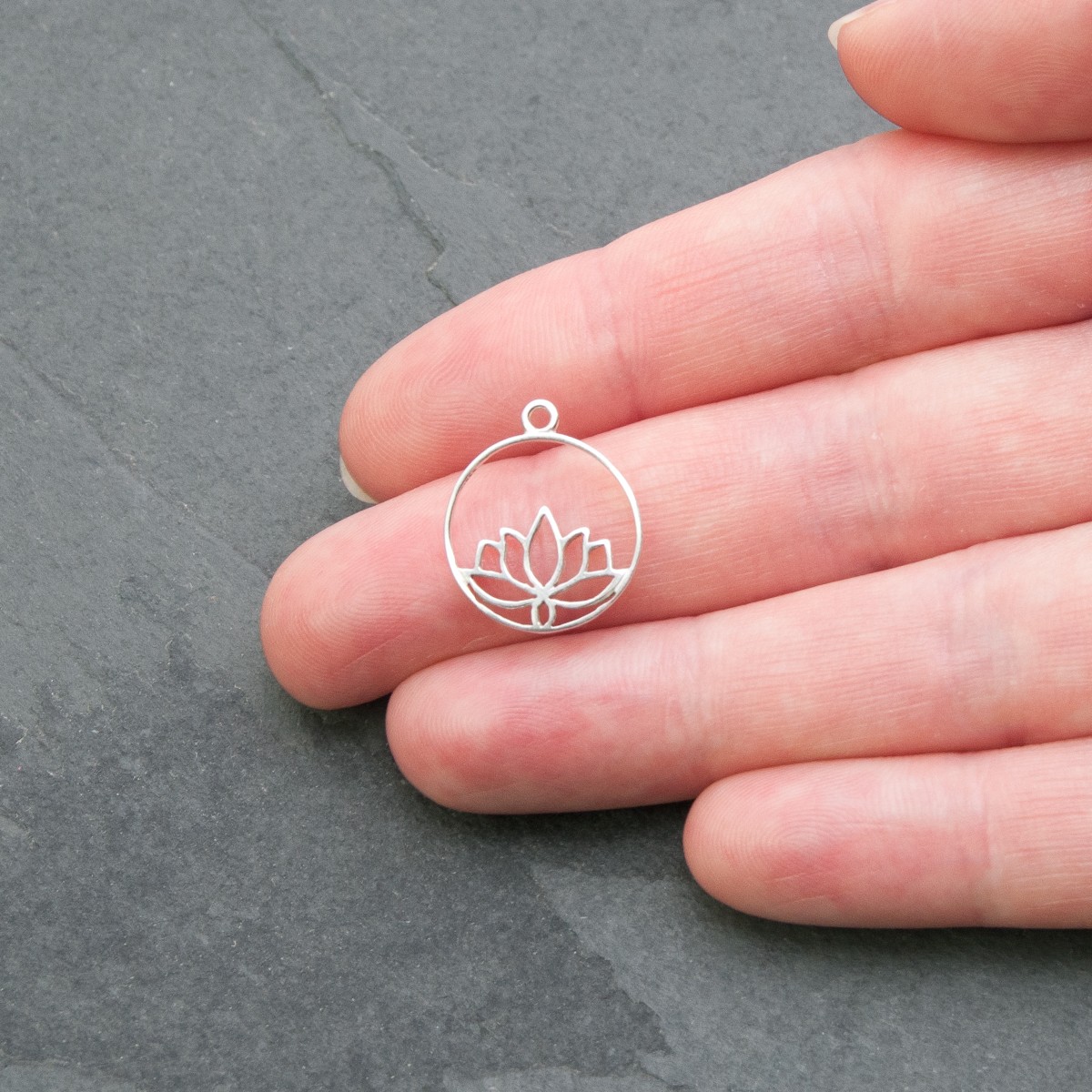 sp330 lotus charm-hand.jpg