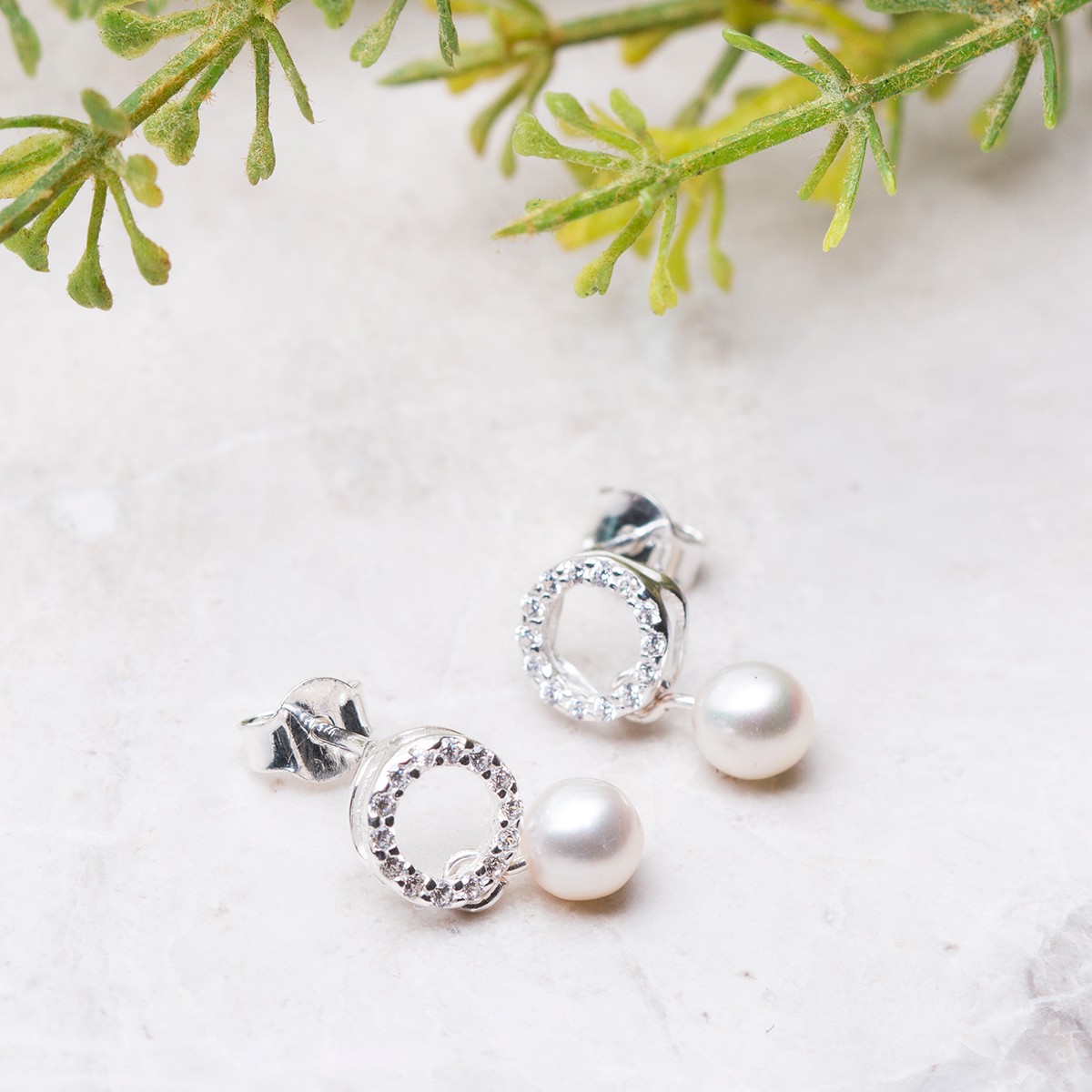 pave pearl earstuds.jpg