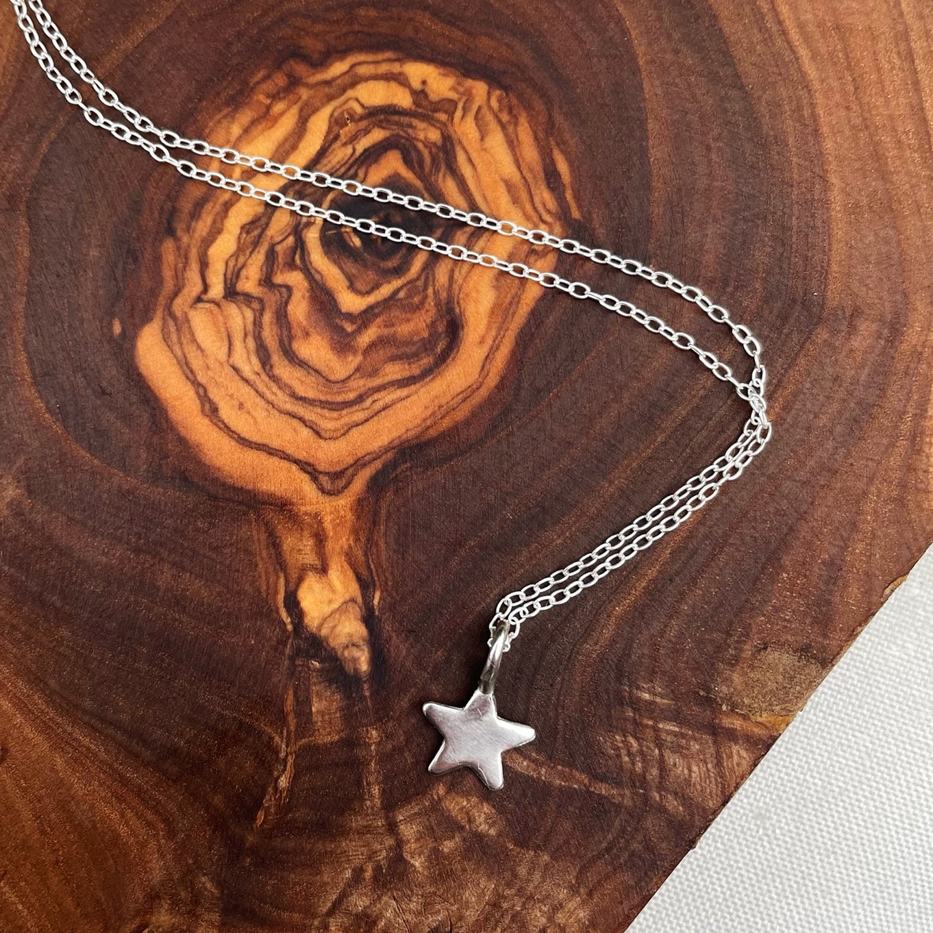 gretels metals star necklaces.jpg