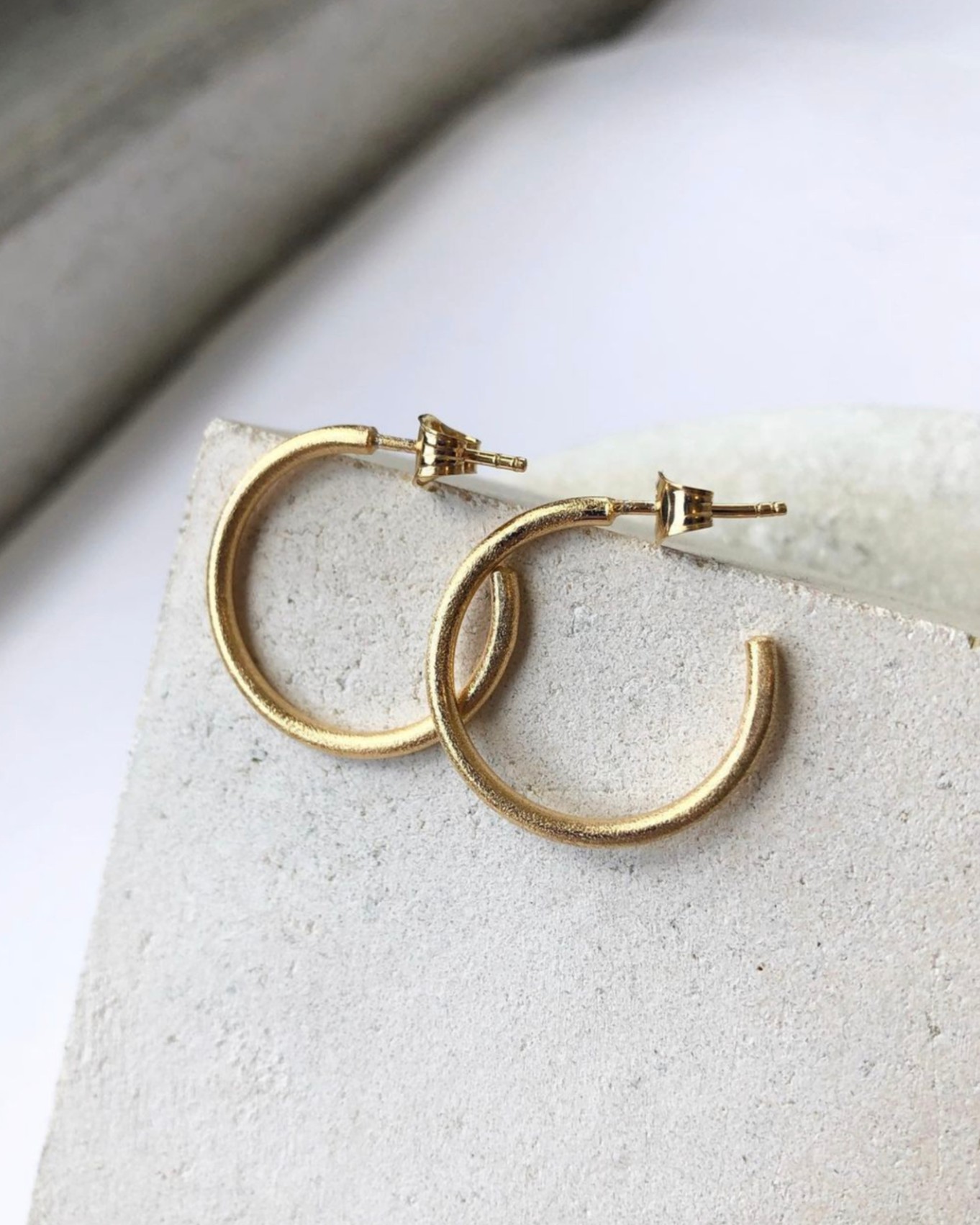 by hiso gold earrings.jpg